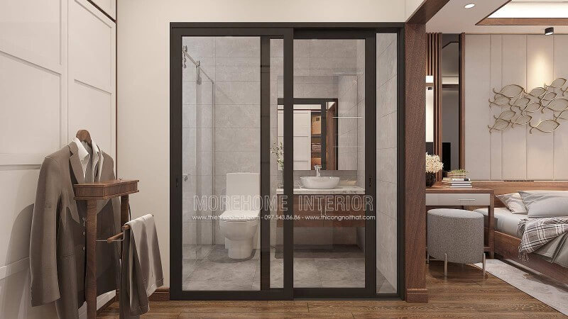 Với không gian diện tích không quá lớn việc sử dụng cửa kính trượt sẽ giúp căn phòng trở nên thông thoáng đặc biệt với lớp cửa kính cường lực càng tăng tính mở trong thiết kế phòng ngủ nam khép kín liền phòng tắm, phòng vệ sinh. thiết kế nội thất chung cư