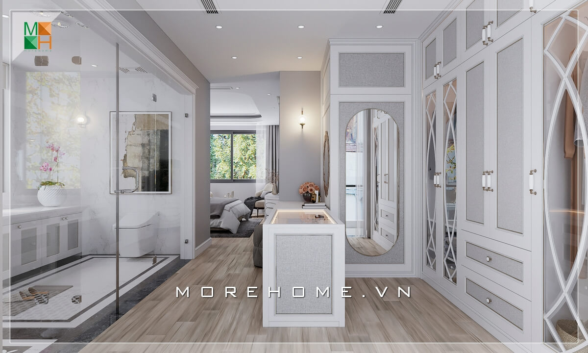 Morehome xin giới thiệu cho bạn mẫu phòng ngủ phong cách tân cổ điển với phòng thay đồ ở trung tâm giúp liên kết không gian phòng ngủ với phòng tắm, tận dụng triệt để diện tích sử dụng và mang lại sự thuận tiện cho sinh hoạt hàng ngày.  Mẫu nội thất biệt thự tân cổ điển